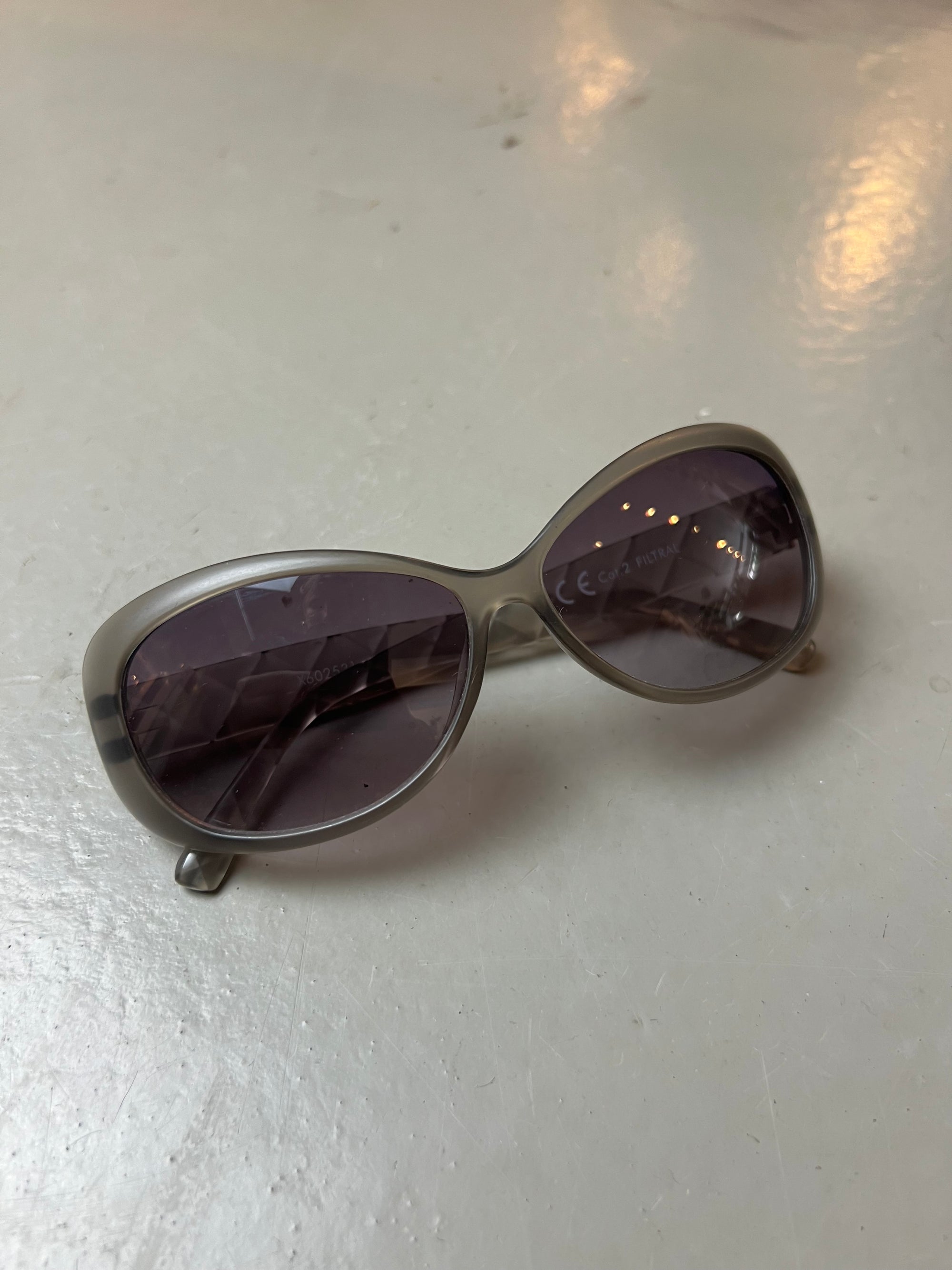 Purple Oval Shaped Sunglasses