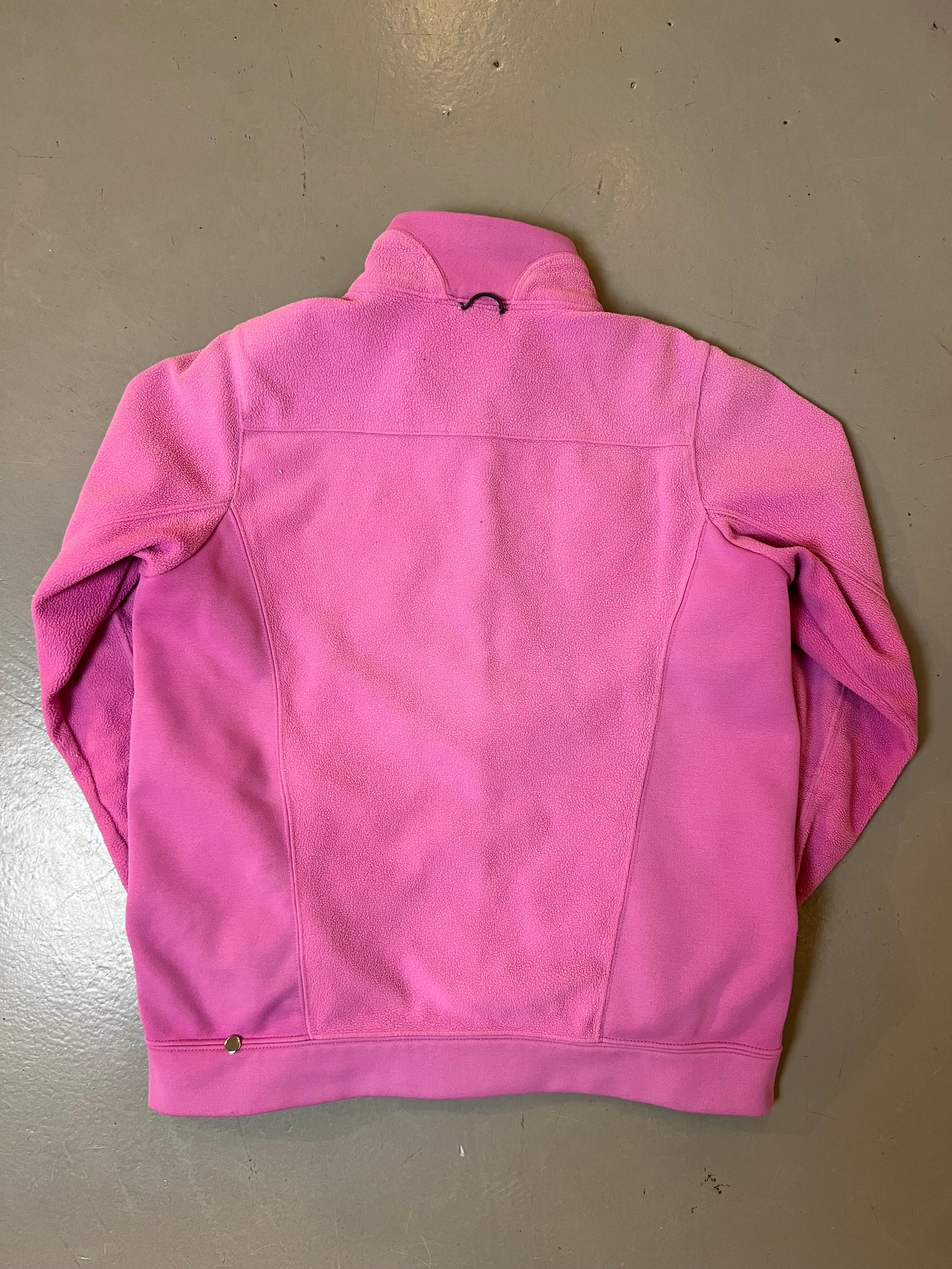 Zu sehen ist eine Pinke Fleece Jacke von Nike ACG